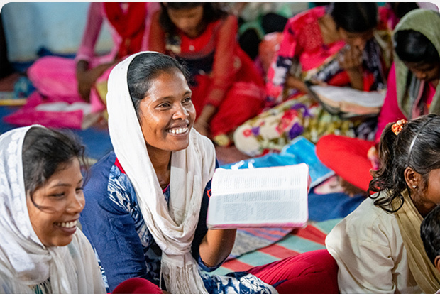 Woman holding the Bible