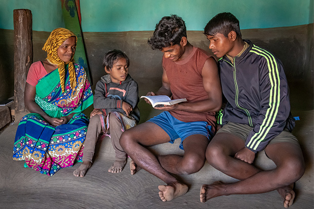 Family reading the Bible together