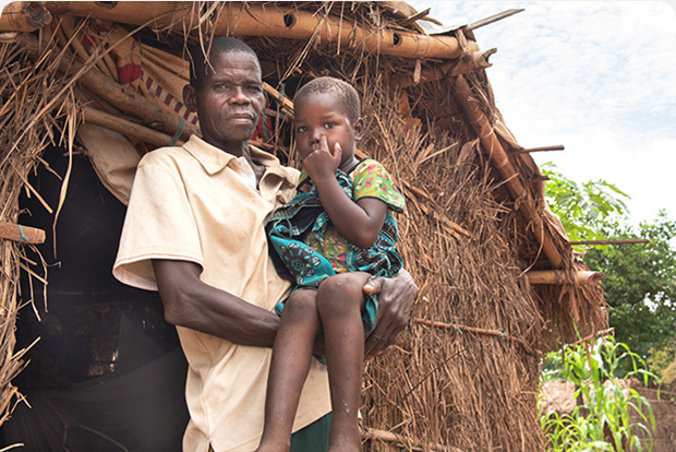 Man holding his child in his arms